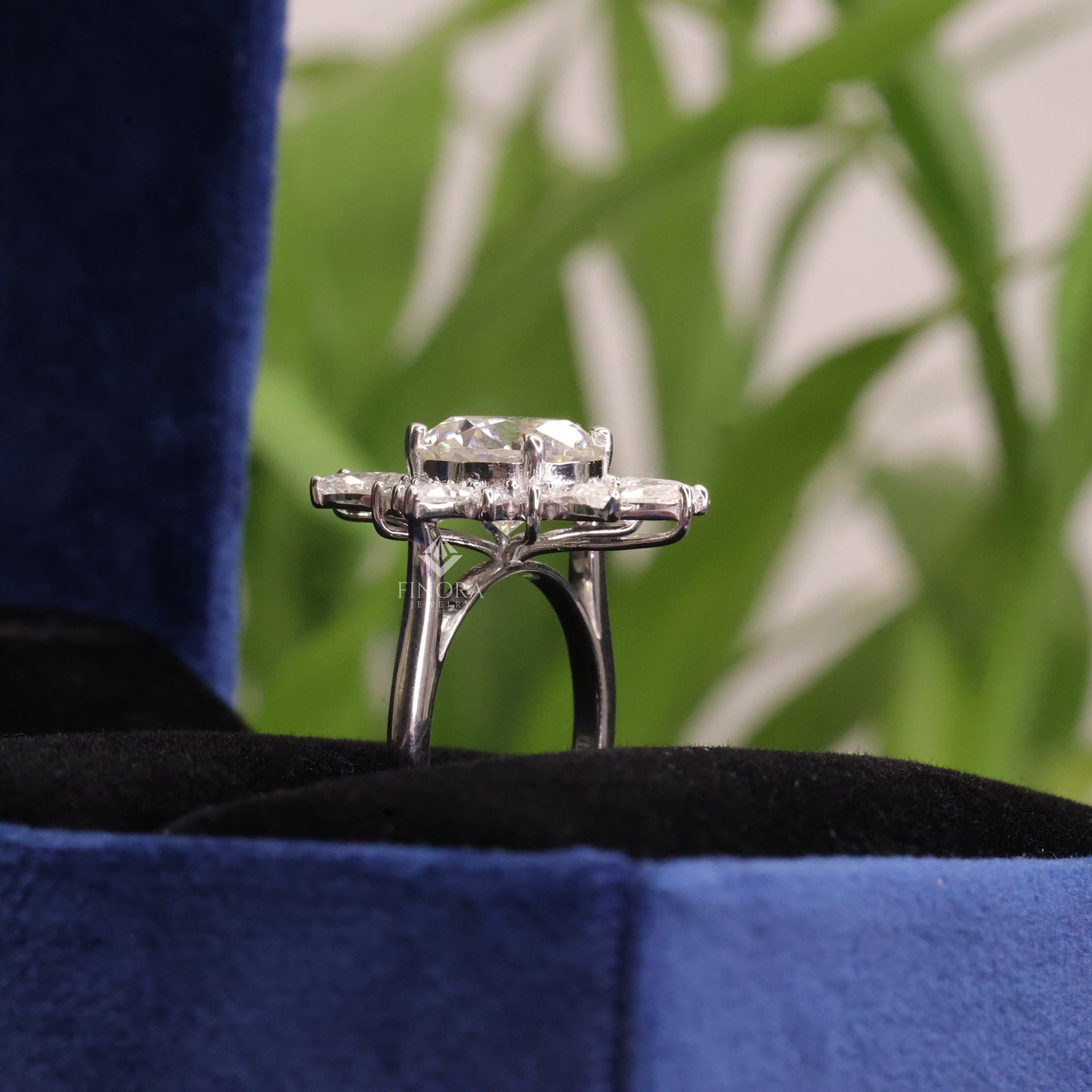 5.41 ct round cut moissanite halo engagement ring with pear & round side stones | finora jewelry