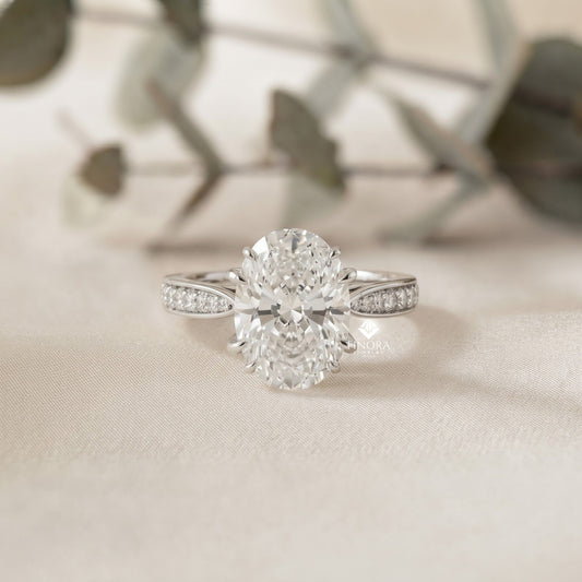Elegant Oval Cut Engagement Ring with Diamond-Accented Band – Timeless Gift for Her – Classic Solitaire Setting in White Gold, Platinum or Silver – Finora Signature Sparkle