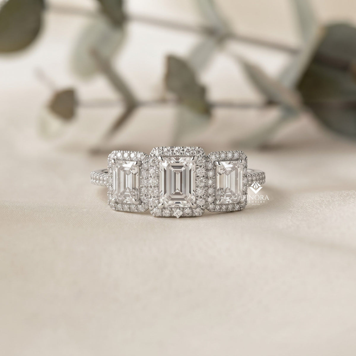 emerald cut moissanite three-stone engagement ring with halo | 2.11 ct | 925 silver, 10k & 14k gold