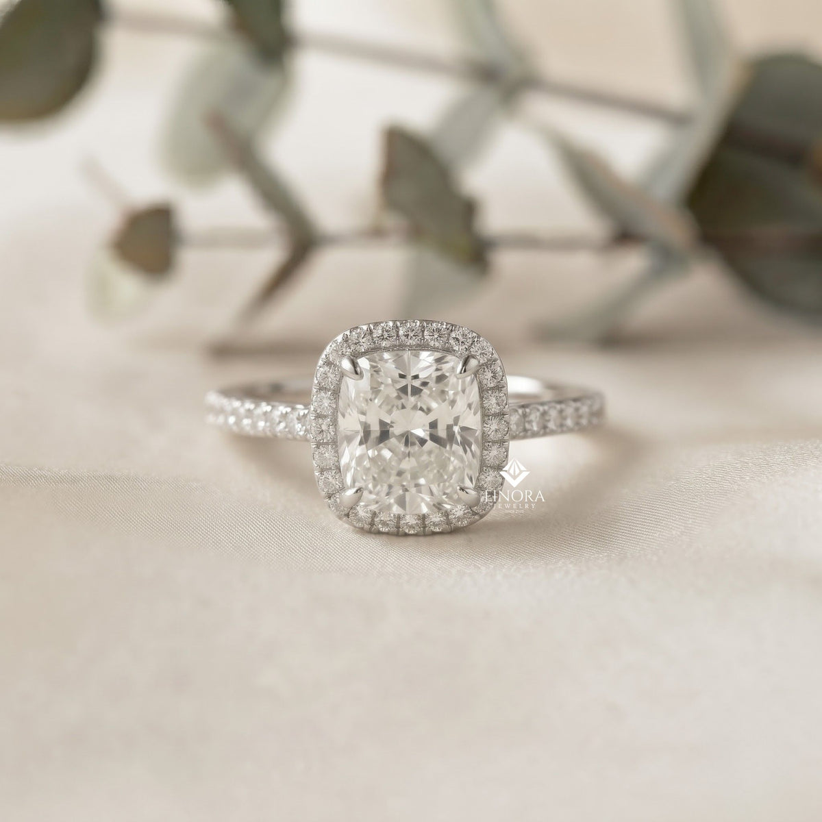 cushion cut halo ring – perfect for engagements or milestone anniversaries