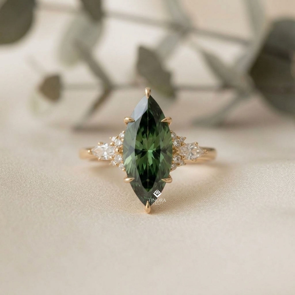 green marquise cut engagement ring – gold cluster design, everyday elegance