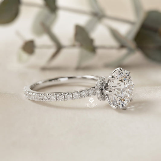 Round Brilliant Moissanite Engagement Ring with Pavé Diamond Band – Classic Four-Prong Solitaire in White, Yellow, or Rose Gold | Finora Jewelry