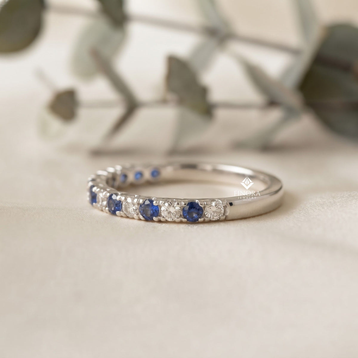 blue & white round cut moissanite half eternity wedding band, stackable ring – finora jewelry