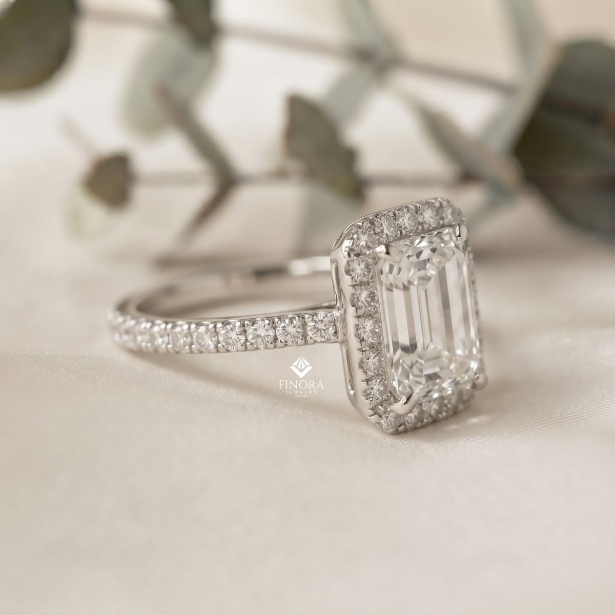 emerald cut halo ring with diamond accents by finora jewelry