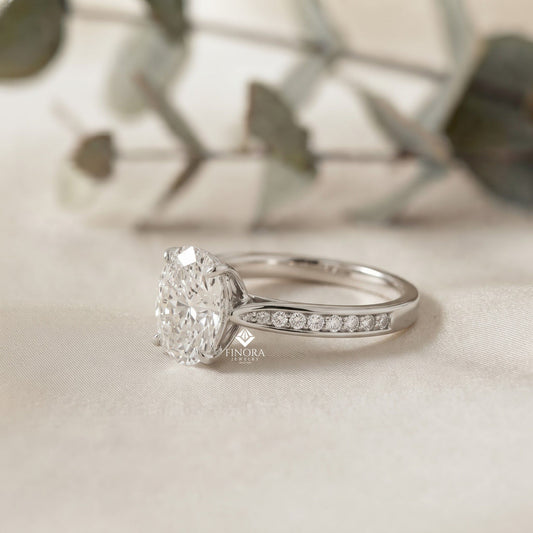 Elegant Oval Cut Engagement Ring with Diamond-Accented Band – Timeless Gift for Her – Classic Solitaire Setting in White Gold, Platinum or Silver – Finora Signature Sparkle