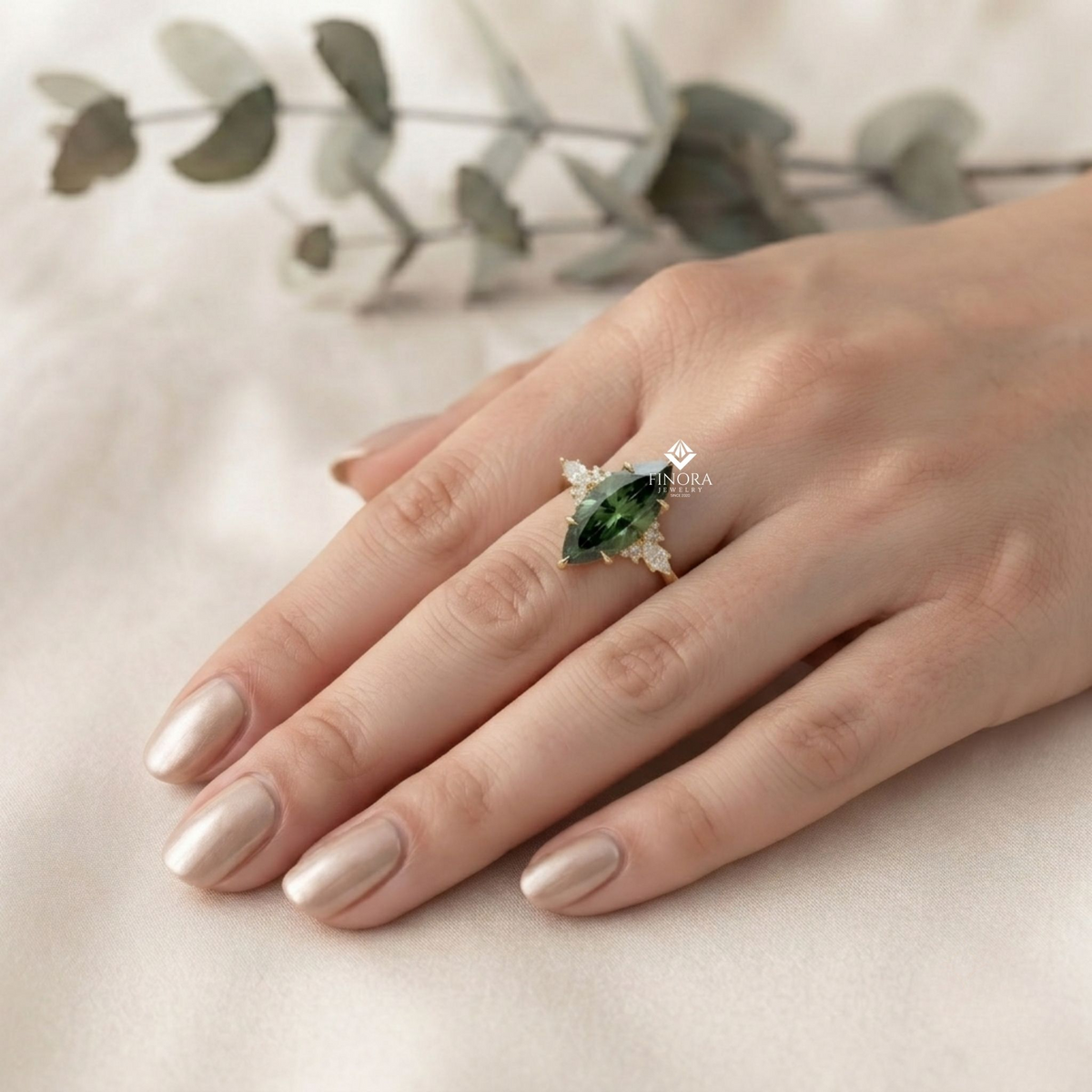 green marquise cut engagement ring – gold cluster design, everyday elegance