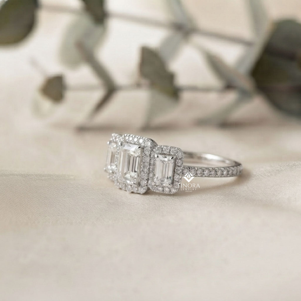 emerald cut moissanite three-stone engagement ring with halo | 2.11 ct | 925 silver, 10k & 14k gold