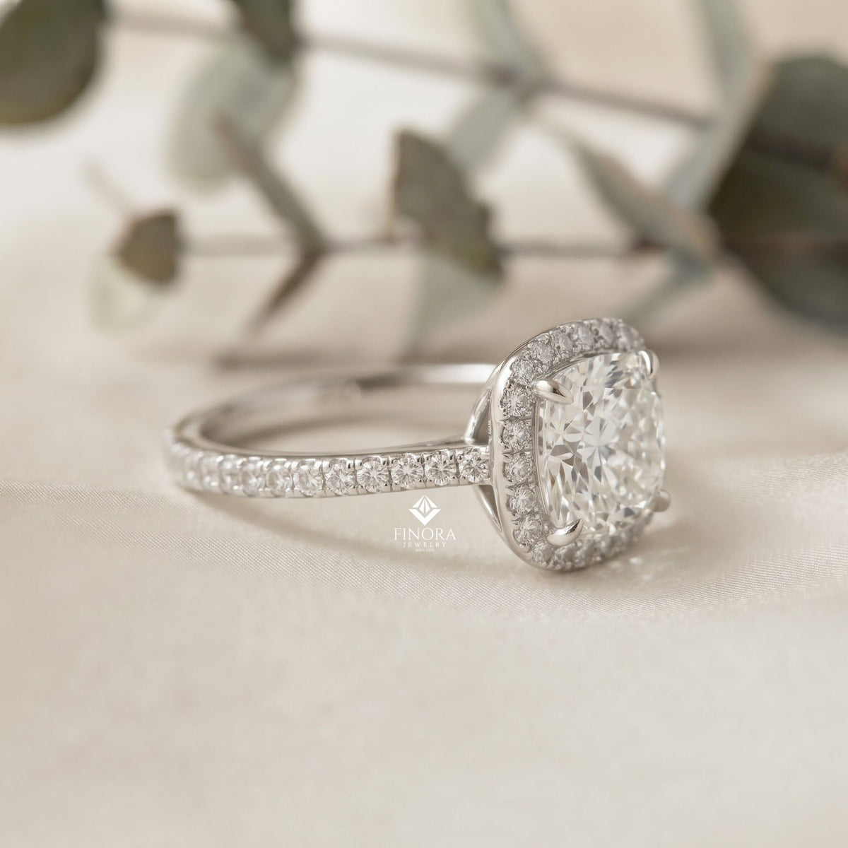 cushion cut halo ring – perfect for engagements or milestone anniversaries