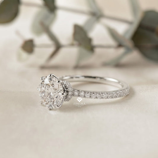 Round Brilliant Moissanite Engagement Ring with Pavé Diamond Band – Classic Four-Prong Solitaire in White, Yellow, or Rose Gold | Finora Jewelry