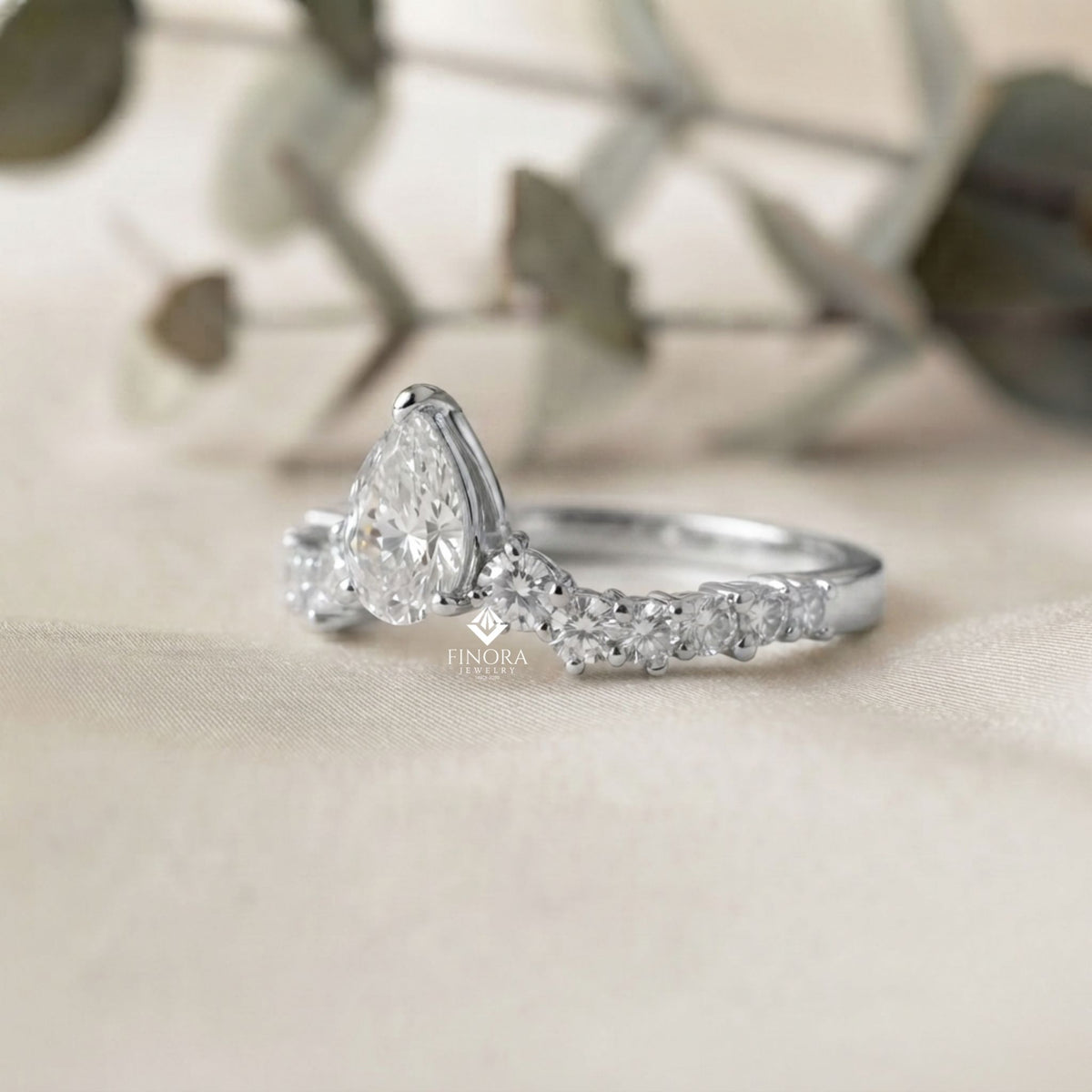 pear cut diamond engagement ring with accent band – finora jewelry