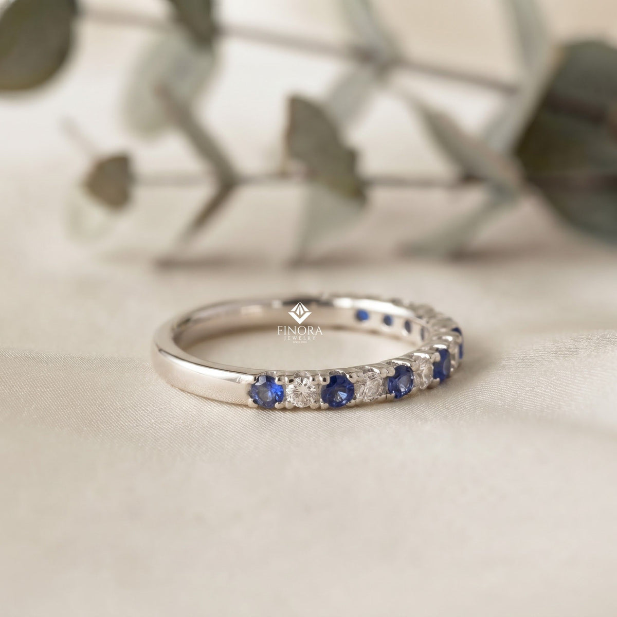 blue & white round cut moissanite half eternity wedding band, stackable ring – finora jewelry