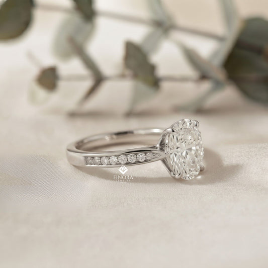 Elegant Oval Cut Engagement Ring with Diamond-Accented Band – Timeless Gift for Her – Classic Solitaire Setting in White Gold, Platinum or Silver – Finora Signature Sparkle