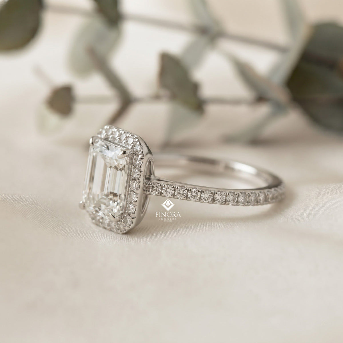 emerald cut halo ring with diamond accents by finora jewelry