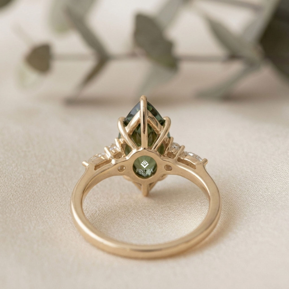 green marquise cut engagement ring – gold cluster design, everyday elegance