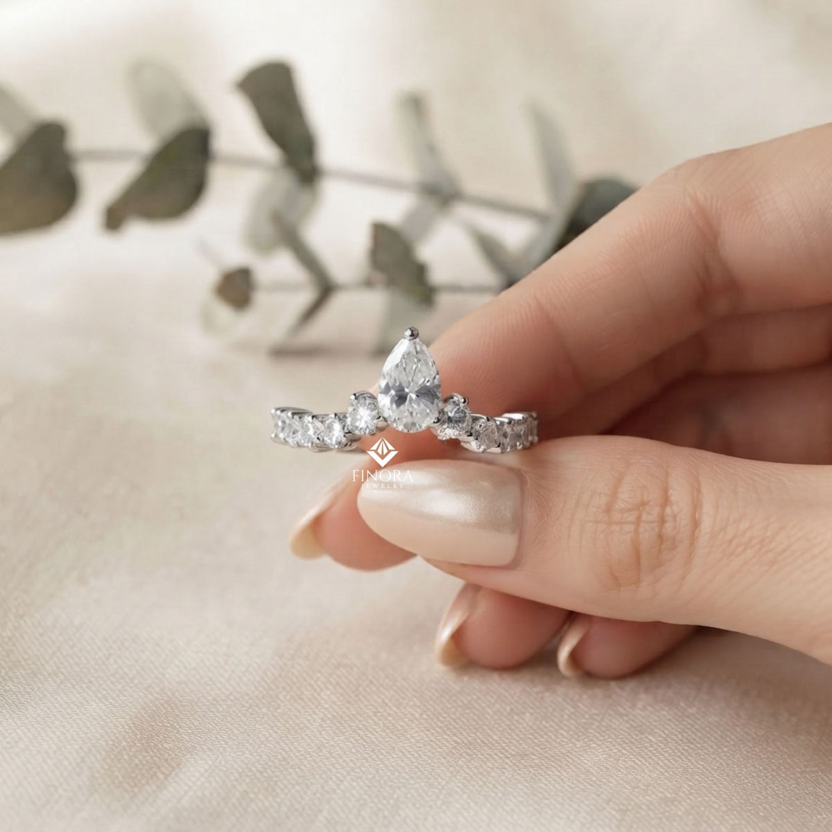 pear cut diamond engagement ring with accent band – finora jewelry