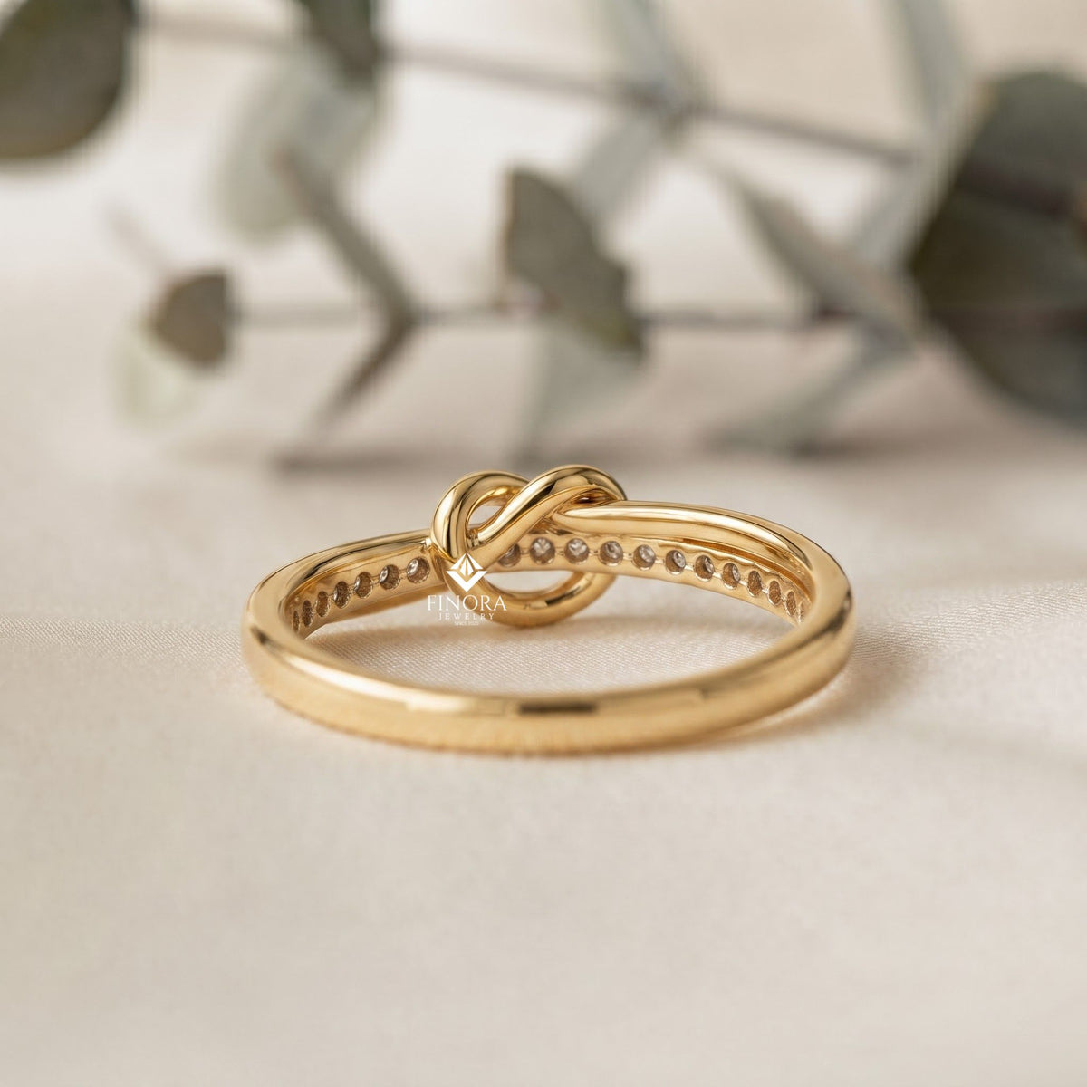 rose gold love knot ring – delicate infinity band with pavé stones