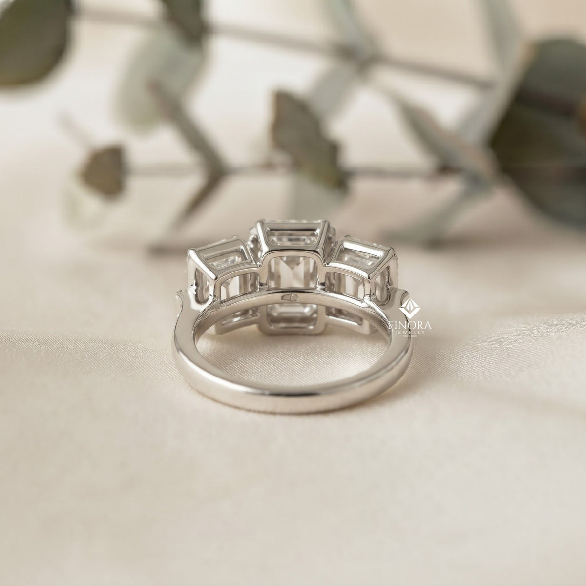 emerald cut moissanite three-stone engagement ring with halo | 2.11 ct | 925 silver, 10k & 14k gold