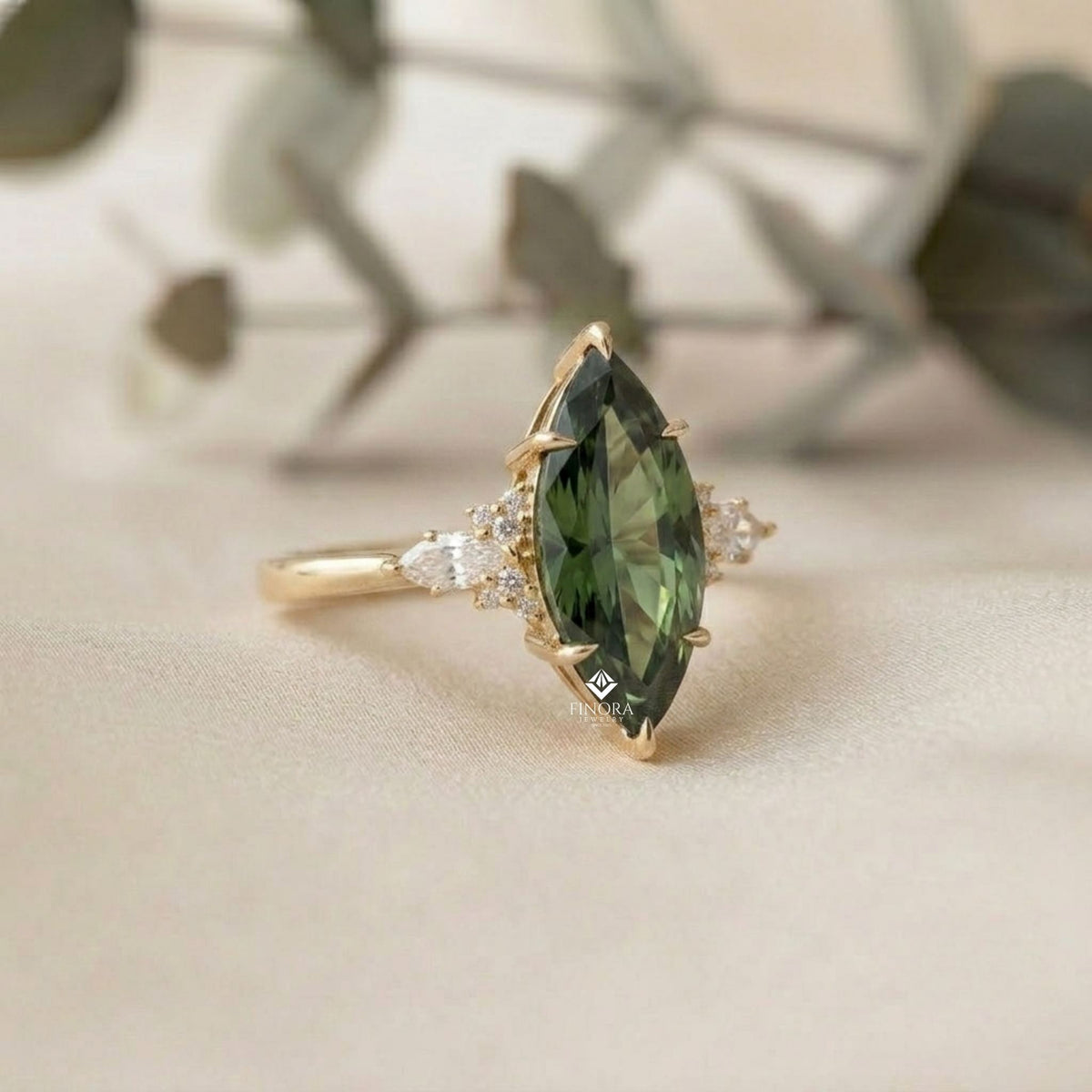 green marquise cut engagement ring – gold cluster design, everyday elegance