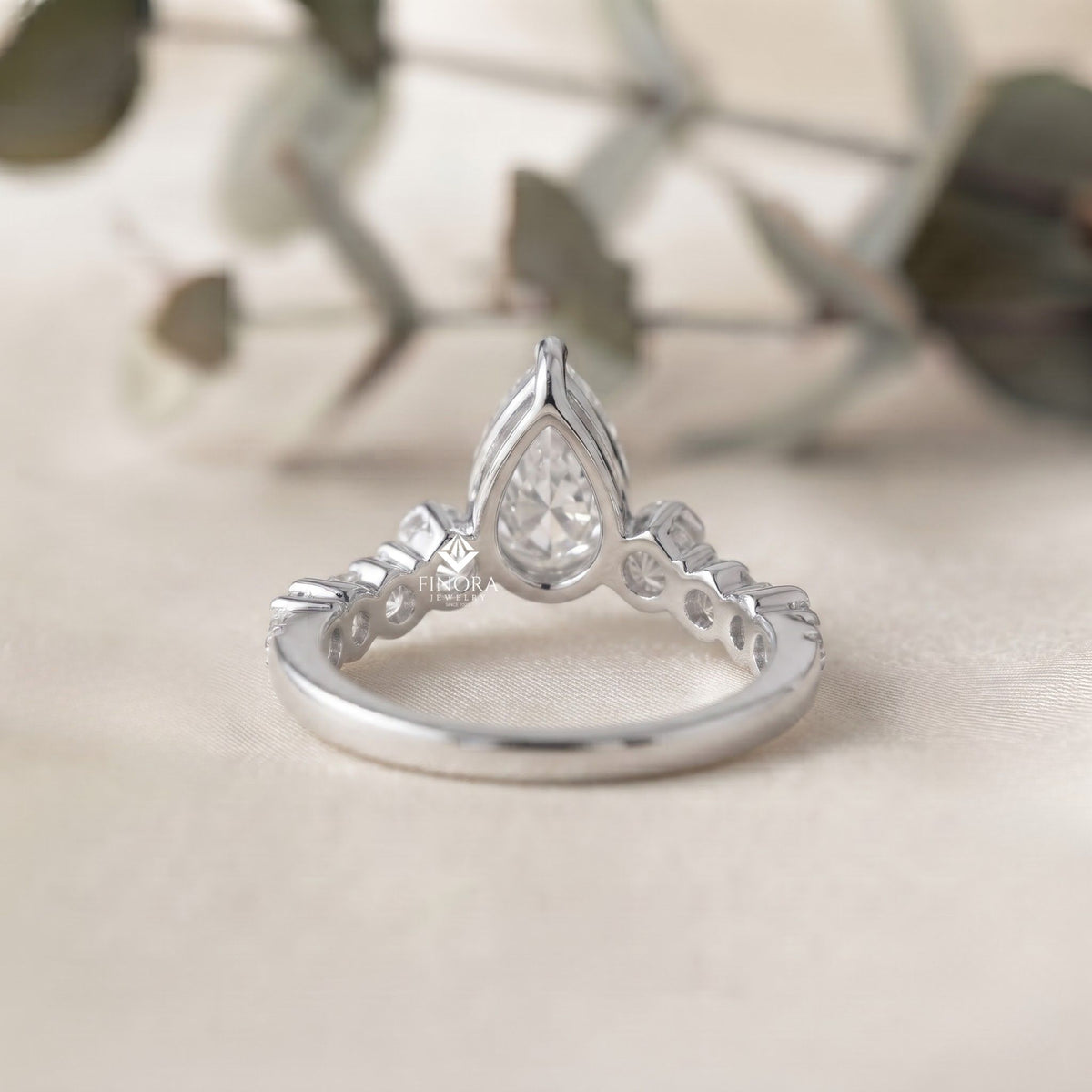 pear cut diamond engagement ring with accent band – finora jewelry