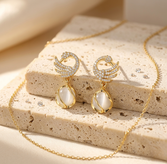 Gold-Tone Crystal Swan Drop Earrings with Teardrop Accents