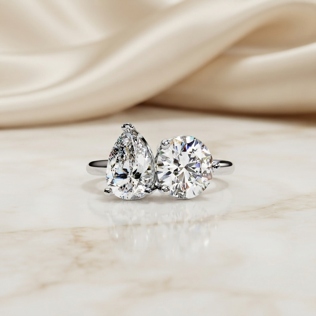two-stone pear & round cut diamond engagement ring – dual brilliance in 925 silver, 10k / 14k gold, or platinum – finora romantic symbol of love’s harmony – elegant gift for her