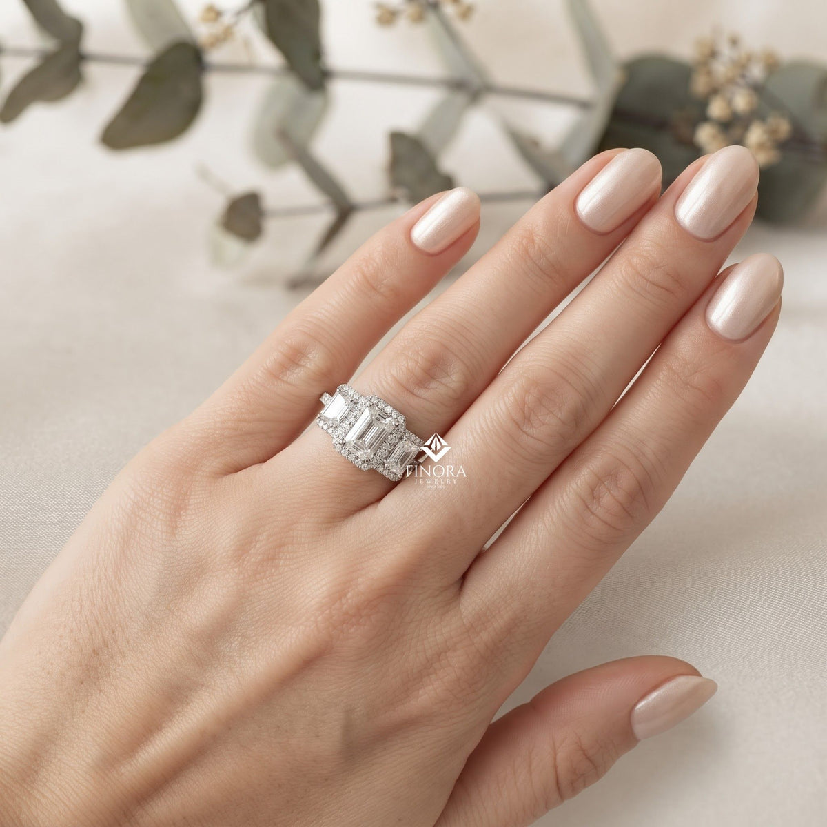emerald cut moissanite three-stone engagement ring with halo | 2.11 ct | 925 silver, 10k & 14k gold