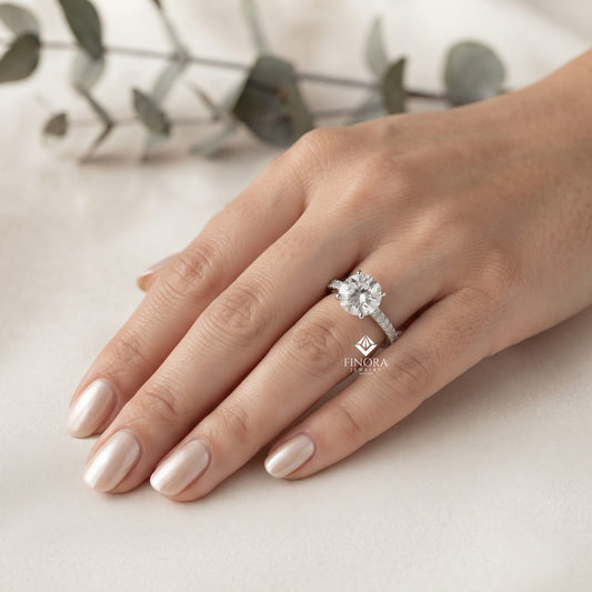 Round Brilliant Moissanite Engagement Ring with Pavé Diamond Band – Classic Four-Prong Solitaire in White, Yellow, or Rose Gold | Finora Jewelry