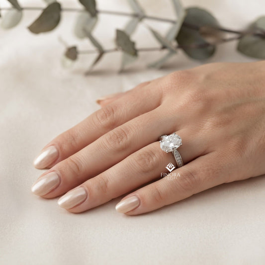 Elegant Oval Cut Engagement Ring with Diamond-Accented Band – Timeless Gift for Her – Classic Solitaire Setting in White Gold, Platinum or Silver – Finora Signature Sparkle
