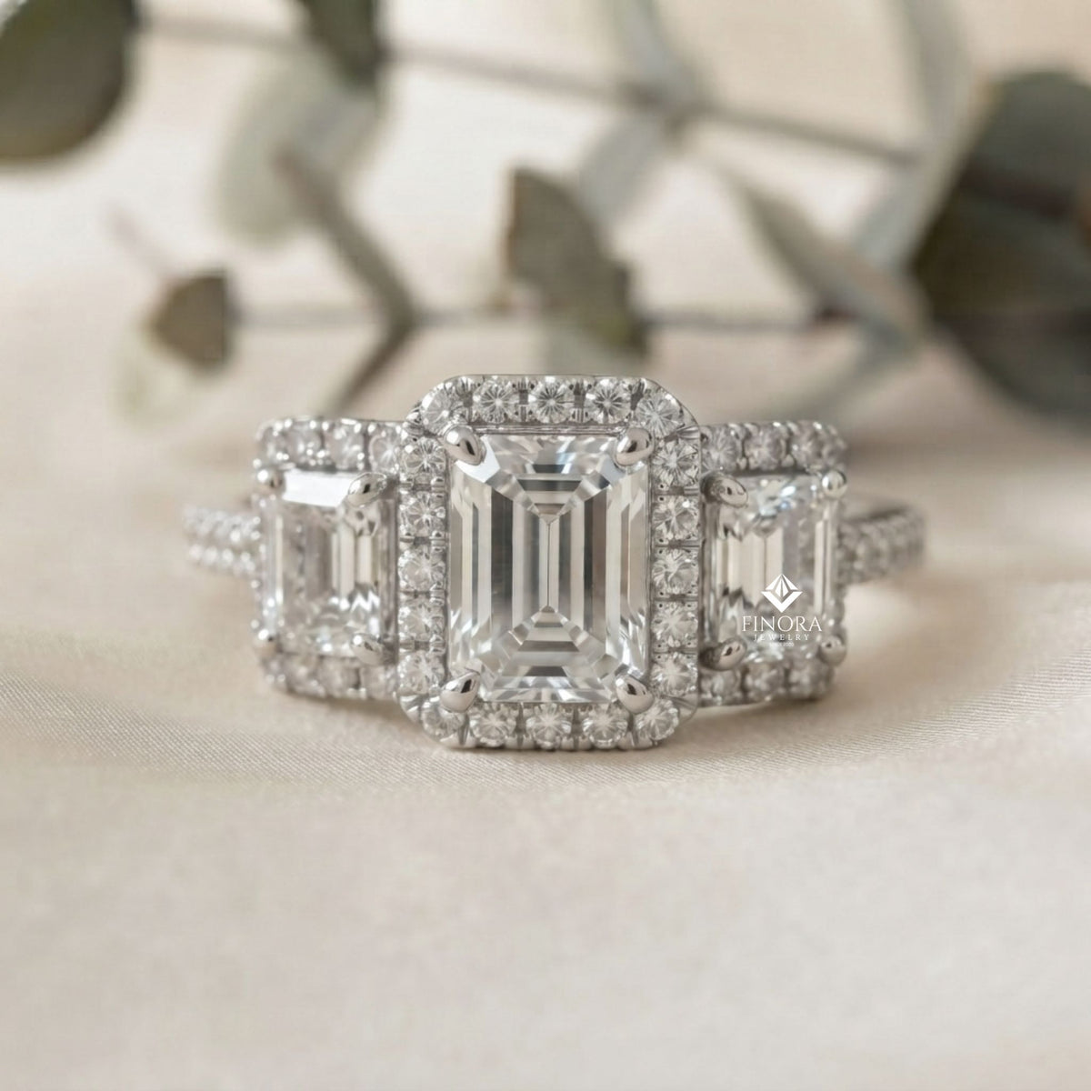 emerald cut moissanite three-stone engagement ring with halo | 2.11 ct | 925 silver, 10k & 14k gold