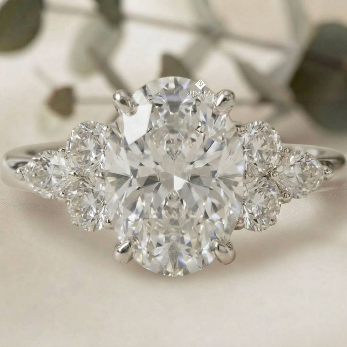 finora jewelry – oval cut diamond seven-stone ring – scalloped shoulder design – available in 10k, 14k gold (white, rose, yellow), 925 silver & platinum