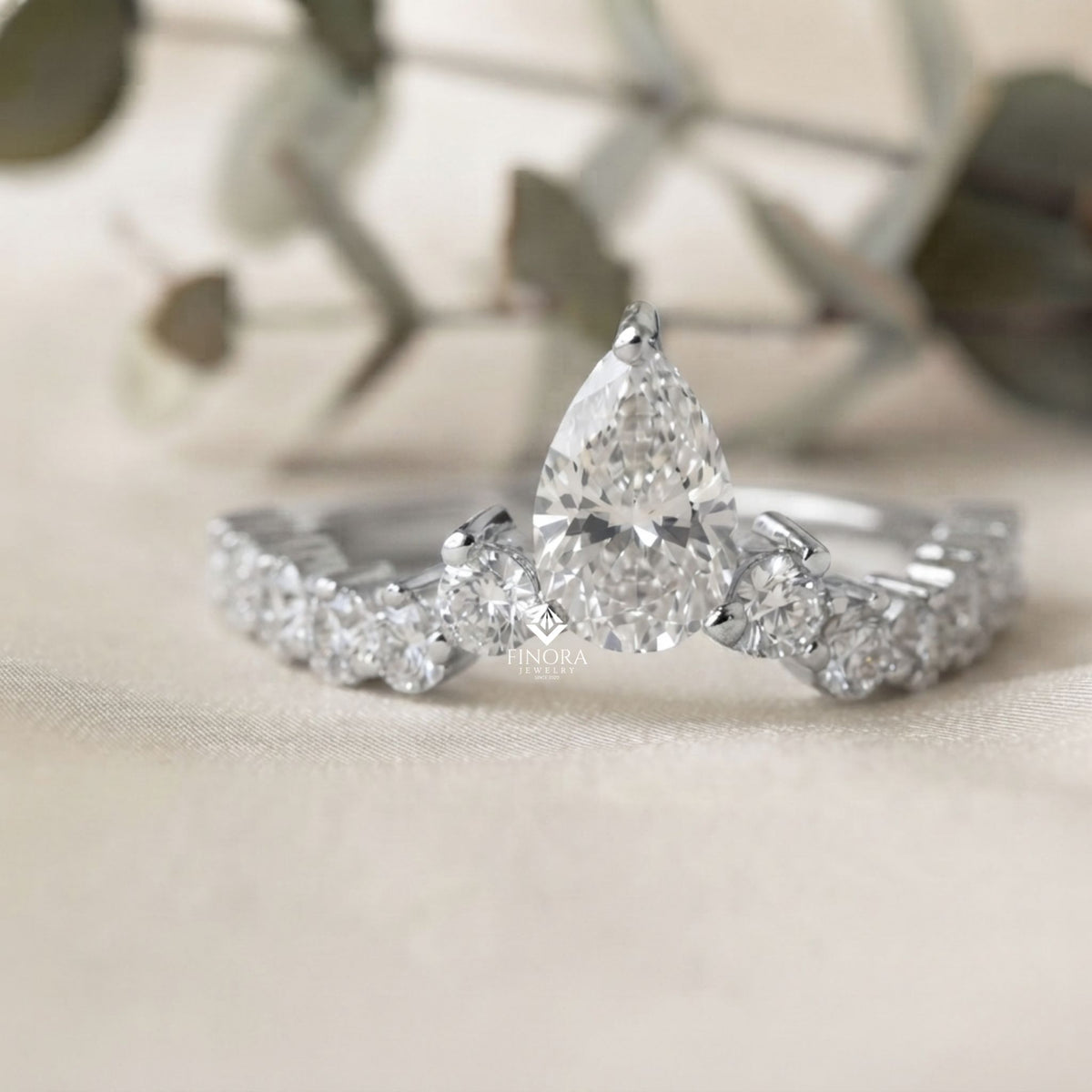 pear cut diamond engagement ring with accent band – finora jewelry