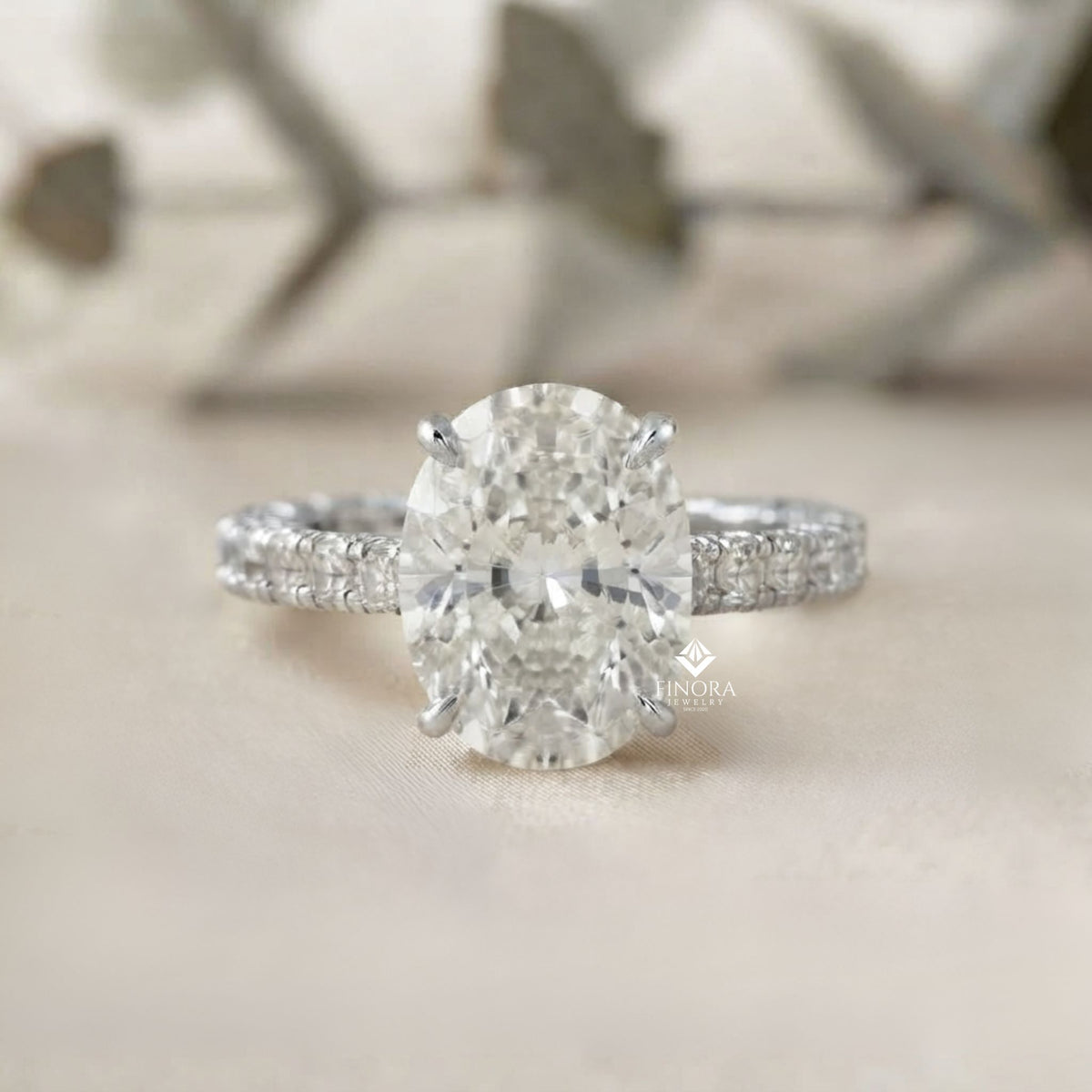 oval cut diamond solitaire with hidden halo and pave band - luxury fine jewelry