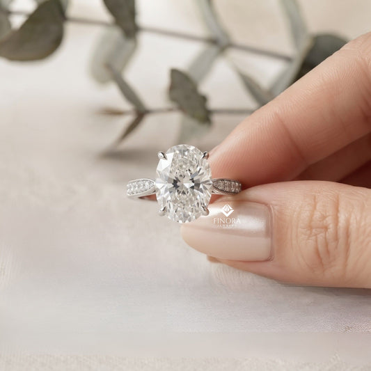 Elegant Oval Cut Engagement Ring with Diamond-Accented Band – Timeless Gift for Her – Classic Solitaire Setting in White Gold, Platinum or Silver – Finora Signature Sparkle