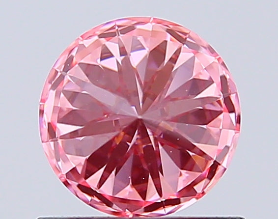 round 0.74 ct igi certified fancy vivid pink diamond – finora jewelry