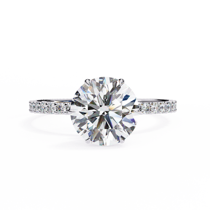Round Brilliant Moissanite Engagement Ring with Pavé Diamond Band – Classic Four-Prong Solitaire in White, Yellow, or Rose Gold | Finora Jewelry