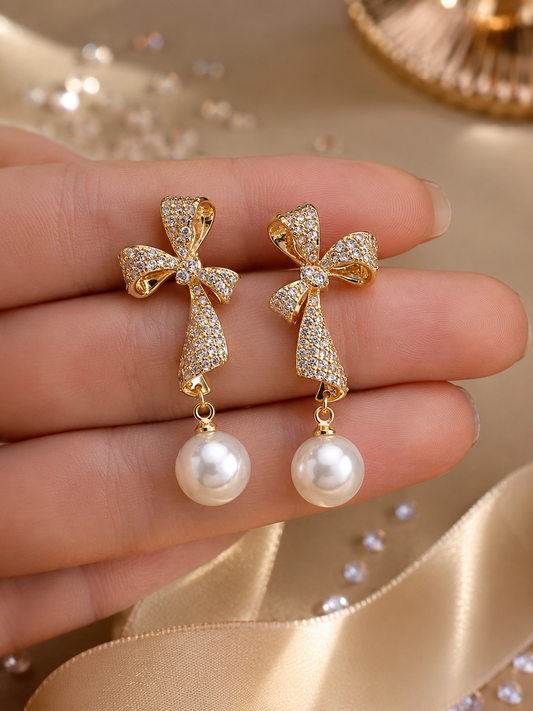 Elegant Crystal-Studded Bow and Pearl Drop Earrings