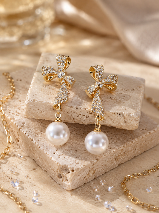 Elegant Crystal-Studded Bow and Pearl Drop Earrings