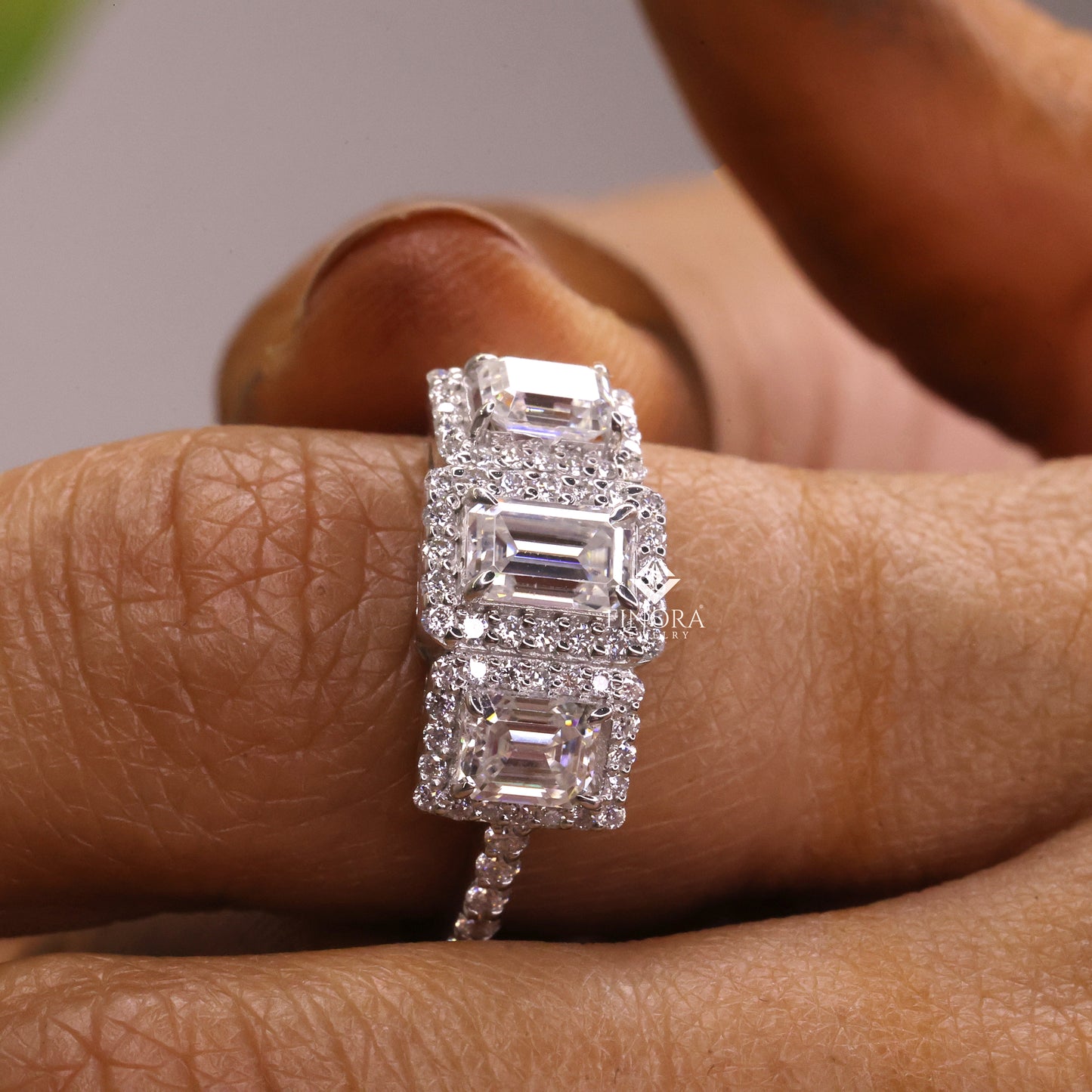 emerald cut moissanite three-stone engagement ring with halo | 2.11 ct | 925 silver, 10k & 14k gold