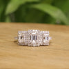 Emerald Cut Moissanite Three-Stone Engagement Ring with Halo | 2.11 CT | 925 Silver, 10K & 14K Gold