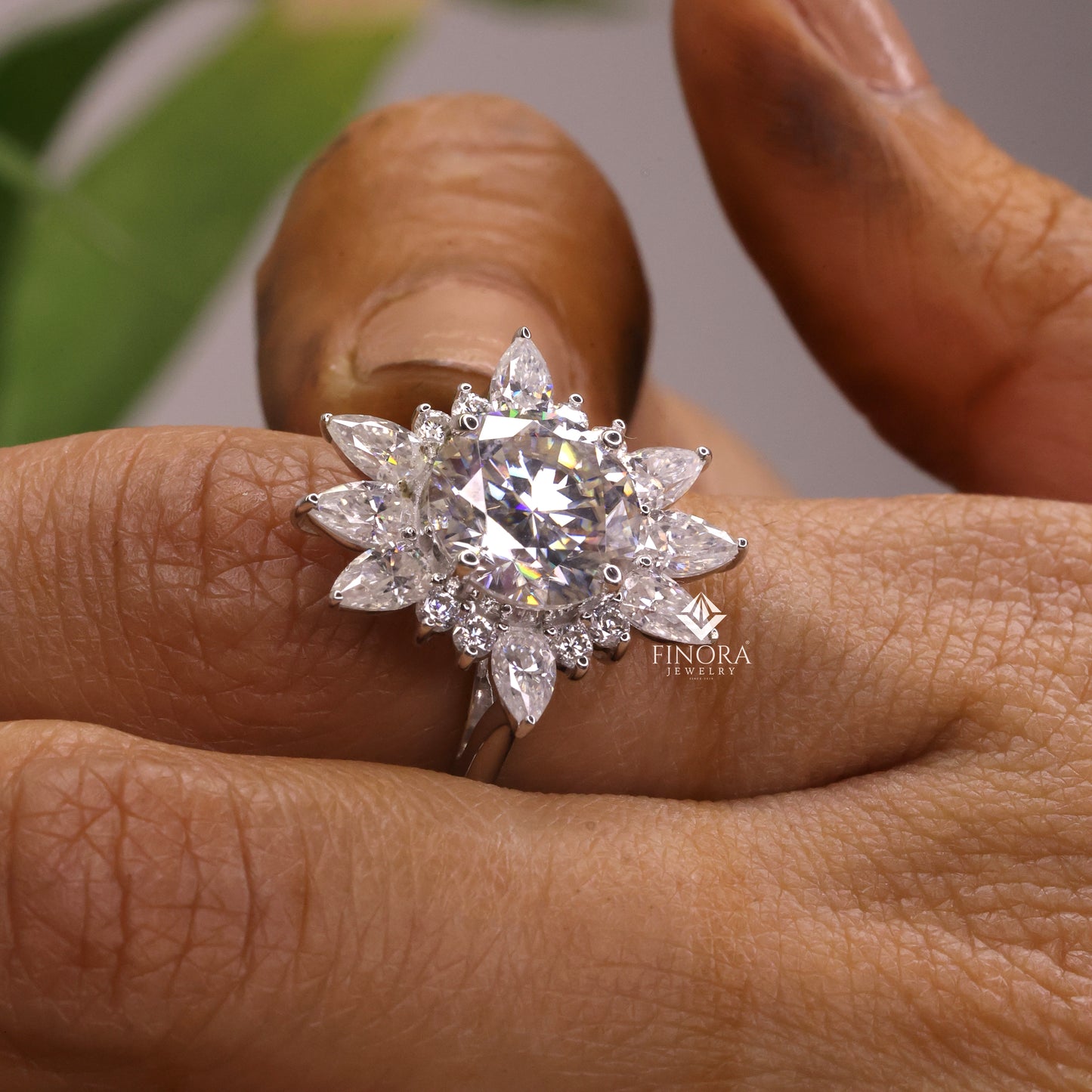 5.41 ct round cut moissanite halo engagement ring with pear & round side stones | finora jewelry