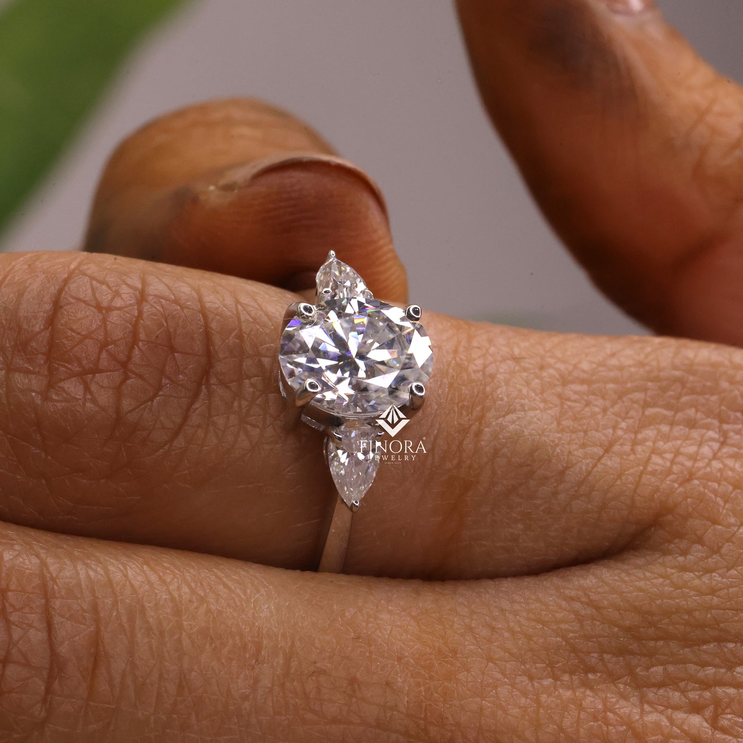 1.67 ct oval cut moissanite three stone engagement ring with pear side stones | 925 silver & 10k/14k gold | finora jewelry