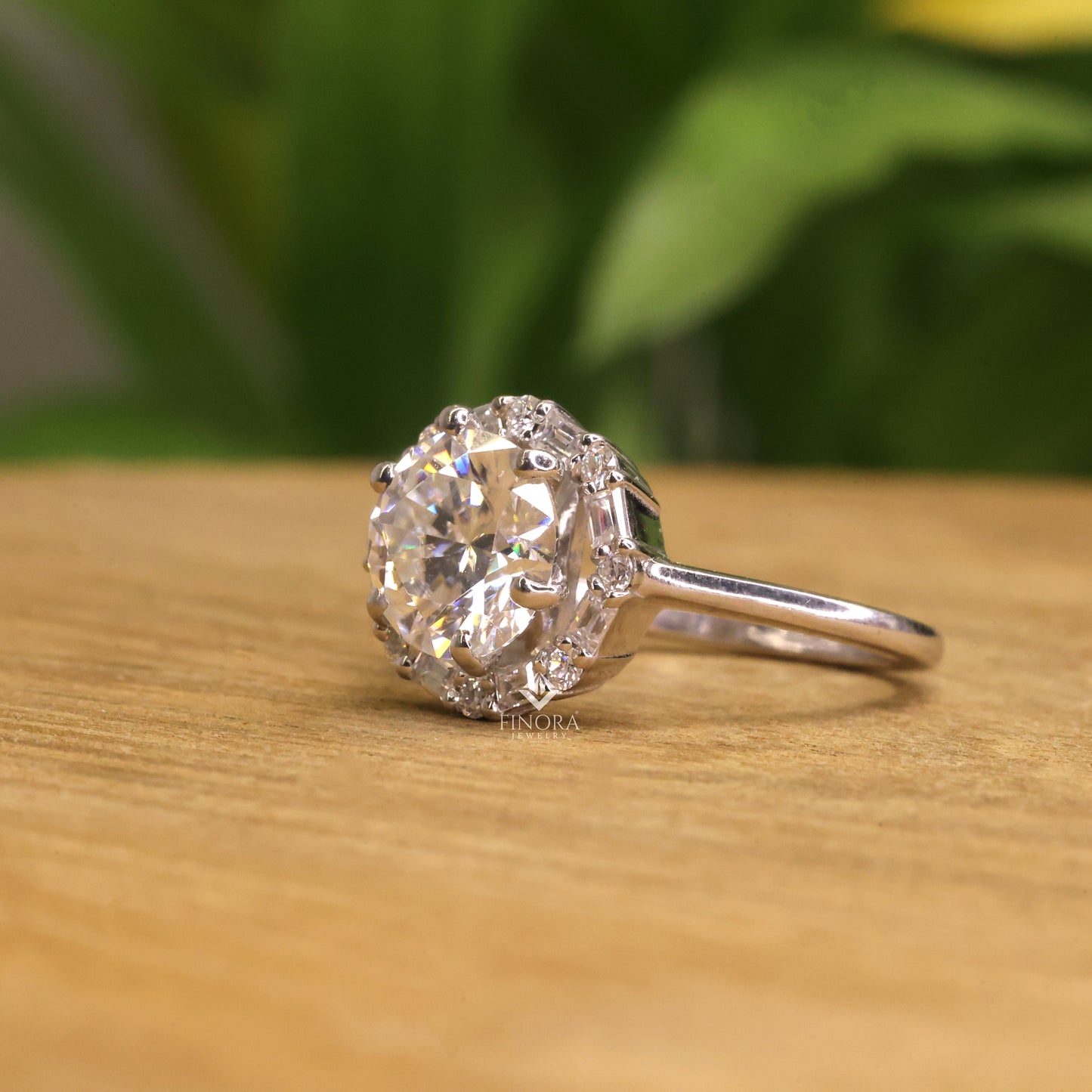 round cut moissanite halo engagement ring with baguette side stones in 925 silver, 10k & 14k gold – finora jewelry