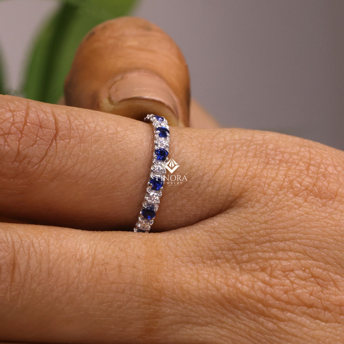 blue & white round cut moissanite half eternity wedding band, stackable ring – finora jewelry