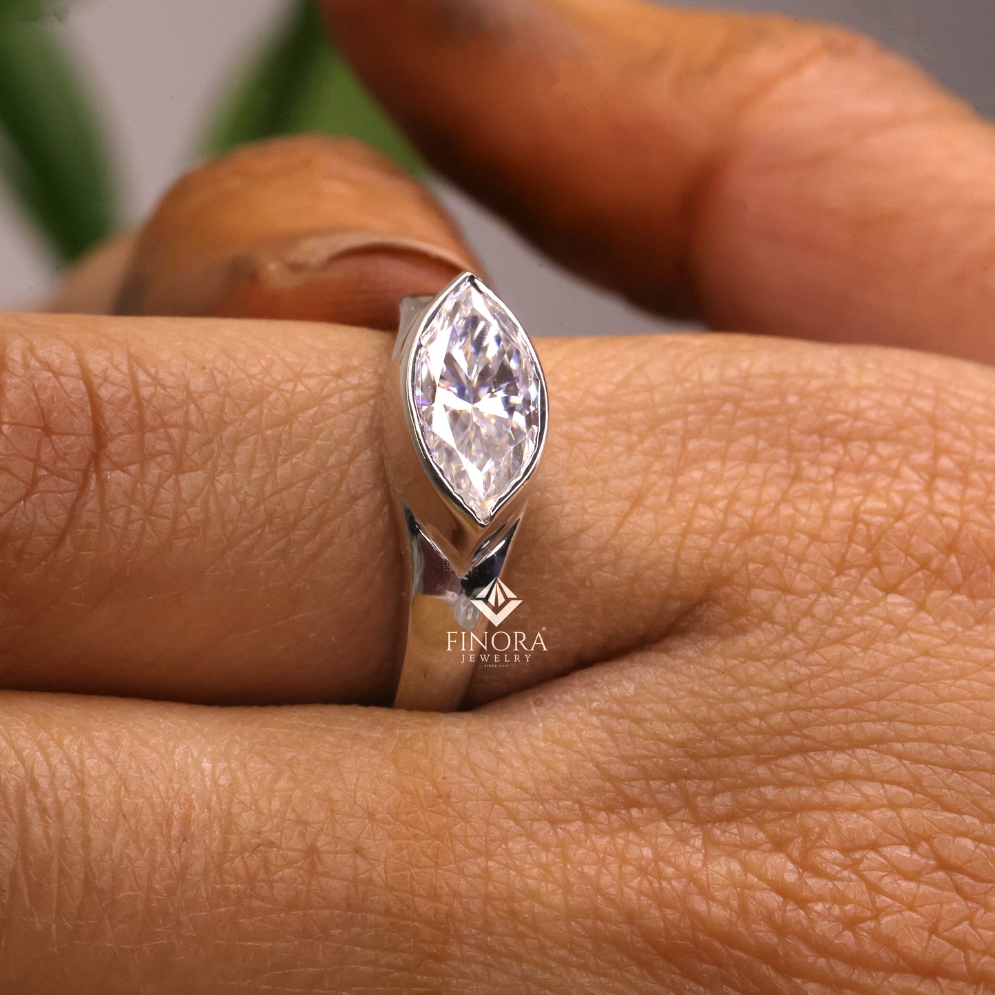 marquise cut moissanite solitaire engagement ring, modern bezel set – finora jewelry