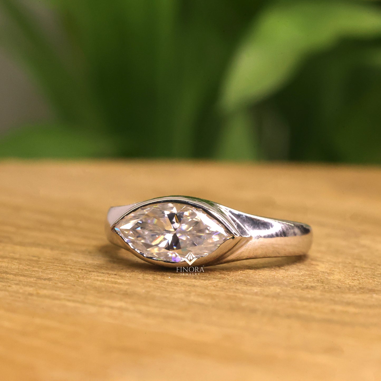 marquise cut moissanite solitaire engagement ring, modern bezel set – finora jewelry